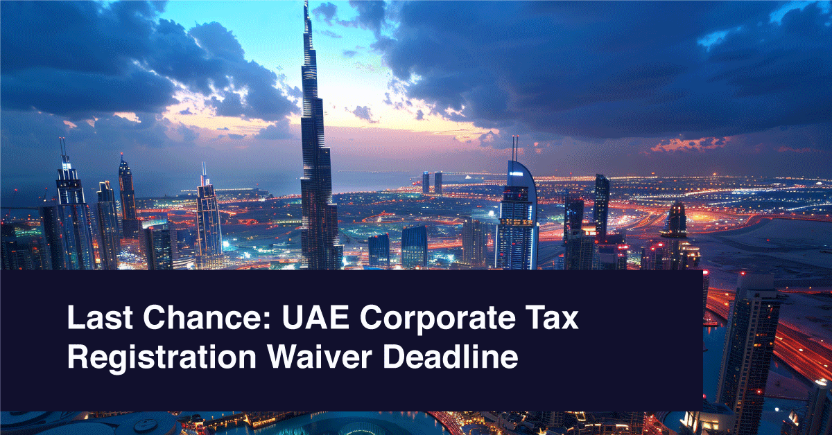 Night view of Dubai skyline with the Burj Khalifa and illuminated city lights under a dramatic cloudy sky, overlaid with the text “Last Chance: UAE Corporate Tax Registration Waiver Deadline” on a dark banner at the bottom.